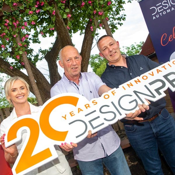 staff celebrate 20 years in business